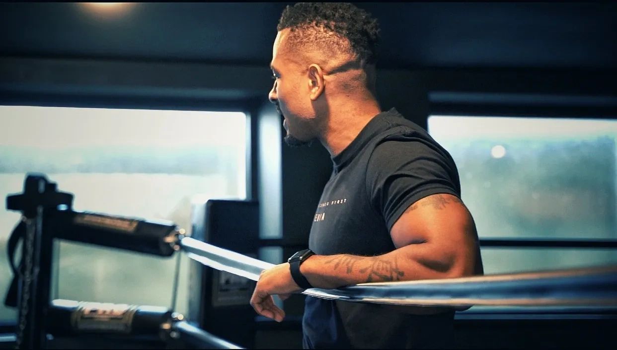 Man training with weights in gym